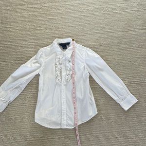 Girls white polo blouse with ruffles.  GUC